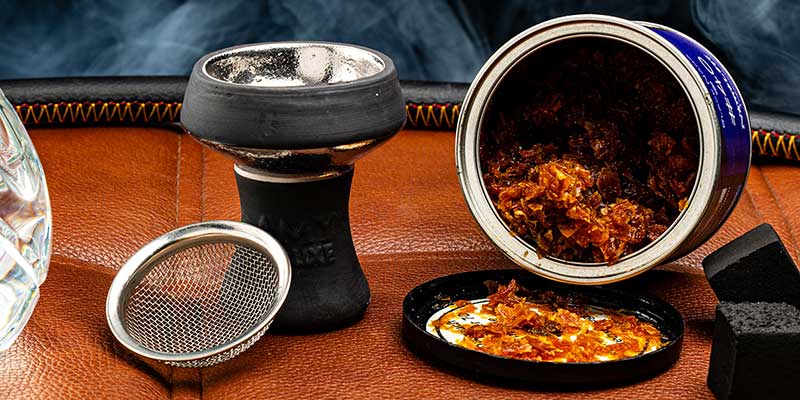 Shisha Kopf mit Tabakdose und Kaminaufsatz – Problemursachen wie zu wenig Hitze, trockener Tabak oder falscher Kopfbau