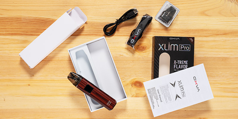 Lieferumfang des Oxva Xlim Pro Pod-Systems mit Geraet, Pod, Kabel und Anleitung